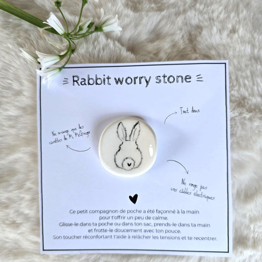 Pierres d'apaisement lapin de dos